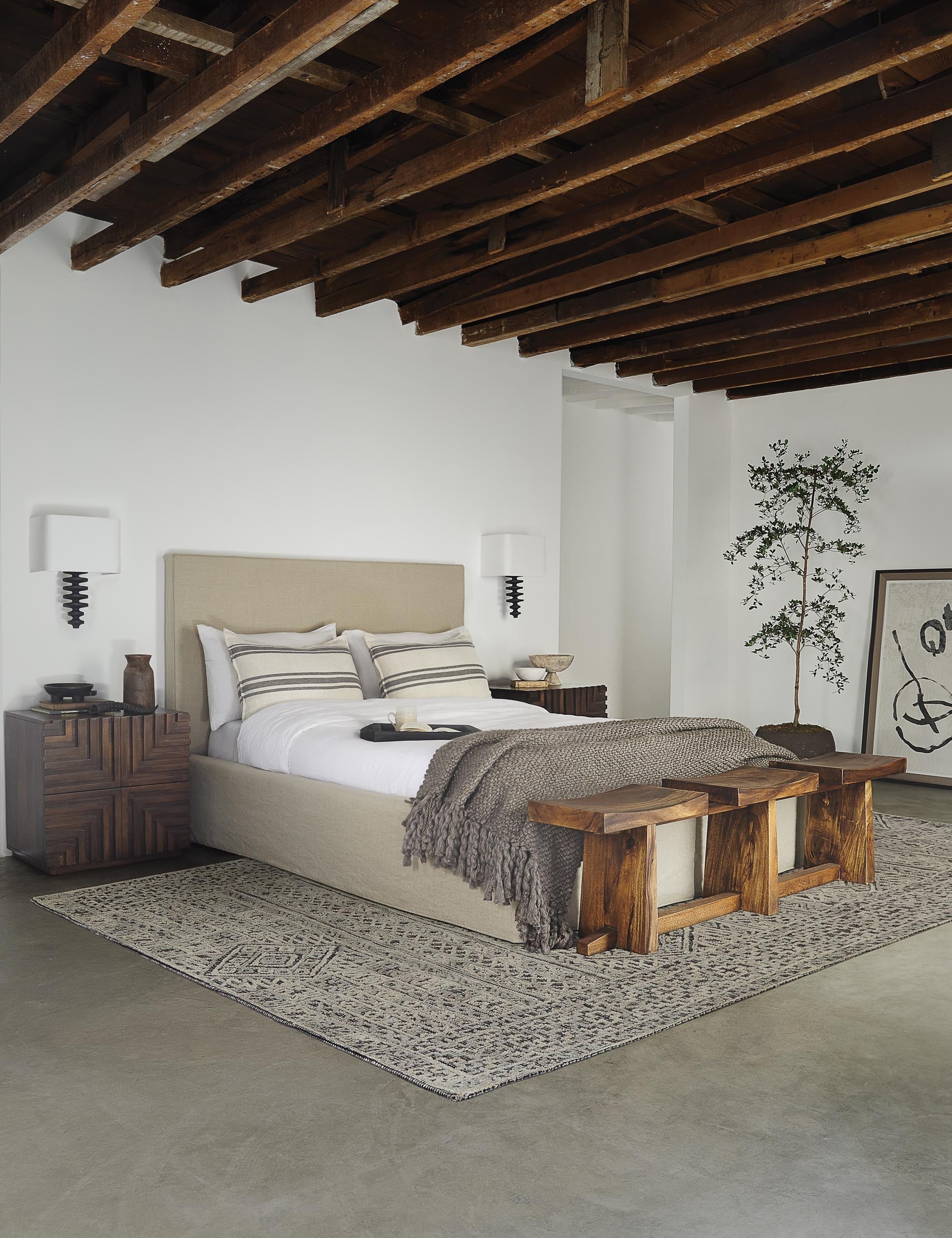 #showall::L0457361 | The Paxton flax linen slipcover bed sits in a room with wooden-beamed ceilings in between two accented wooden nightstands