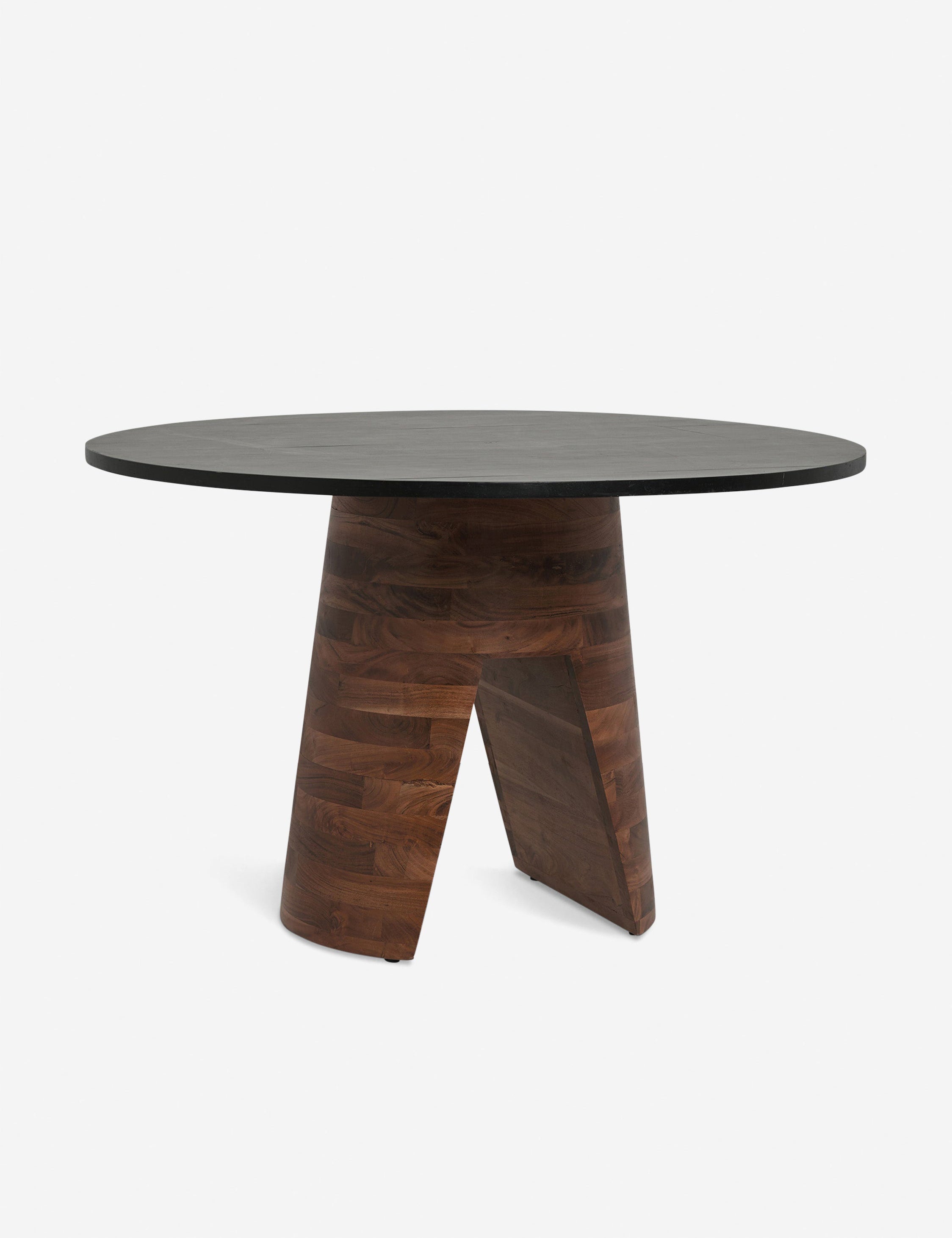 #color::black-and-brown | Adler acadia wooden round dining table with a wood grain texture and sculptural base
