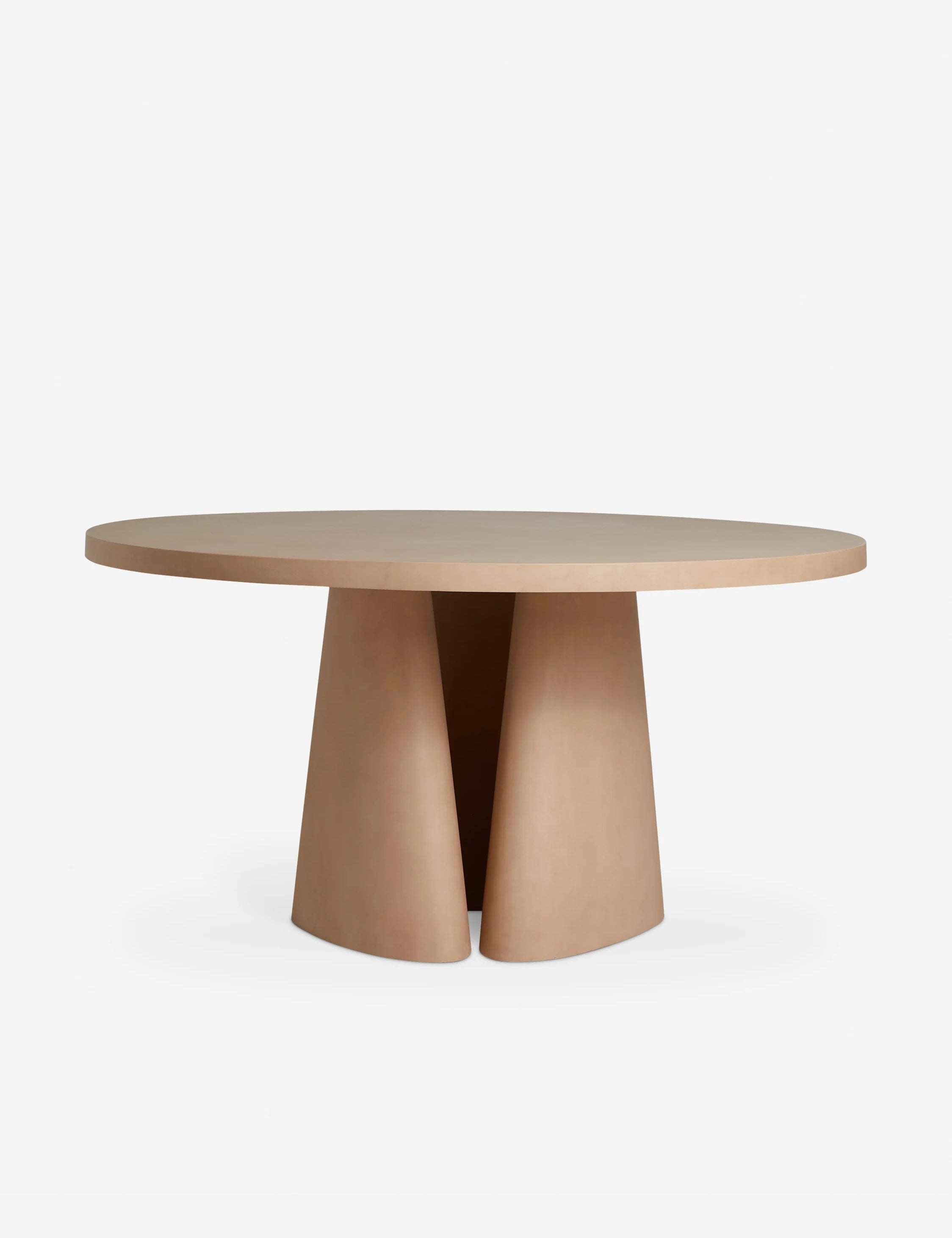 #color::terracotta | Keating sculptural round fiberstone outdoor dining table.
